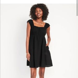 NWT Short-Sleeve Cutout Bow Mini
Babydoll Swing Dress